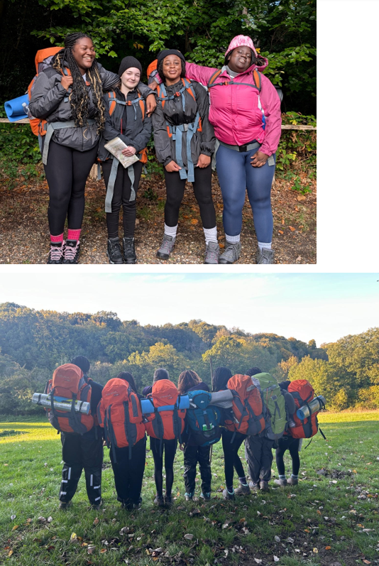 A group of people with backpacks

Description automatically generated