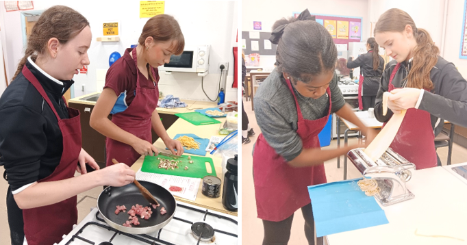 A couple of women cooking in a kitchen

Description automatically generated